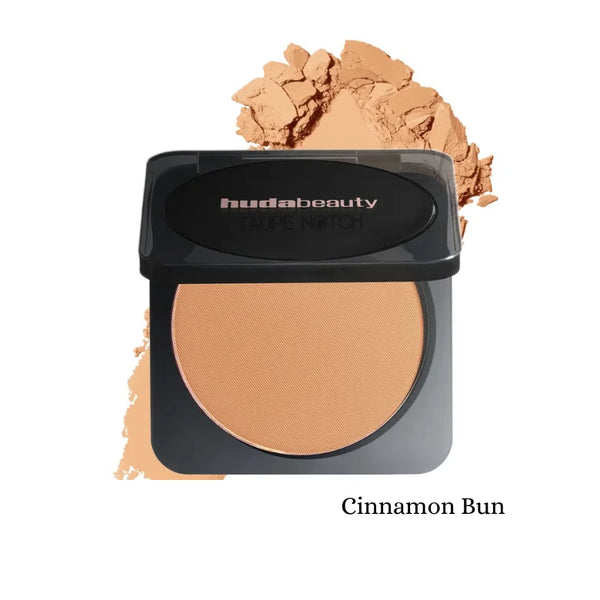 Easy Bake pressed powder compact in Cinnamon Bun shade, round pressed pan visible