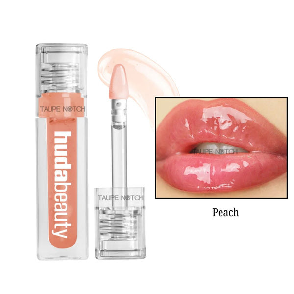 Jelly lip oil in Peach, clear tube with peach tint and doe-foot applicator.