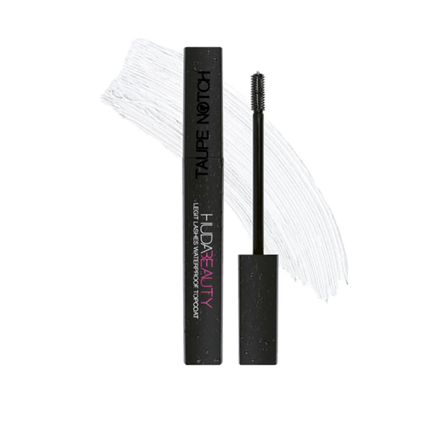 Huda Beauty waterproof mascara topcoat with black tube and wand, white lash bristles