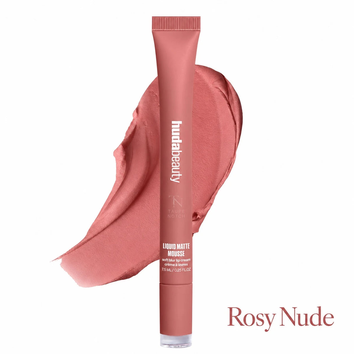 A tube of hudabeauty Liquid Matte Mousse lip product in the shade Rosy Nude, shown upright in front of a matching pinkish nude smear on a white background.