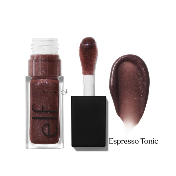 Lip oil in Espresso Tonic shade, rich cocoa shimmer; wand applicator and capped tube.