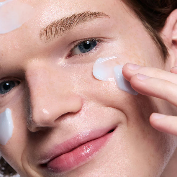 Hydrating pale blue gel on face, under-eye and cheek from sleeping mask