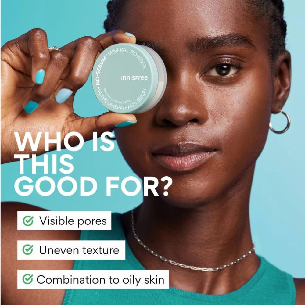 Innisfree No Sebum Matte Mineral Powder compact held near face by model