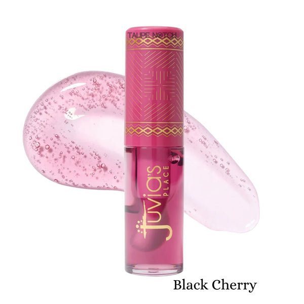 Magic lip oil in Black Cherry shade, magenta glossy tube with angled applicator tip