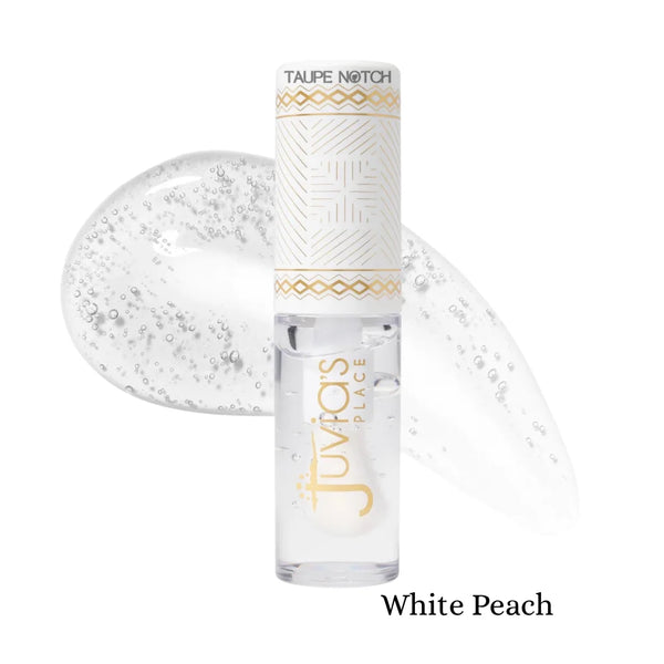 Magic lip oil in White Peach shade, clear glossy tube with applicator tip