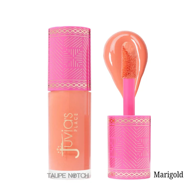 Liquid blush in Marigold shade, peach-orange liquid with pink applicator tip