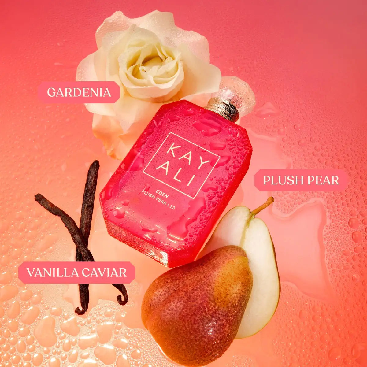 Pink perfume bottle with gardenia, plush pear, vanilla caviar, and pear on a pink background