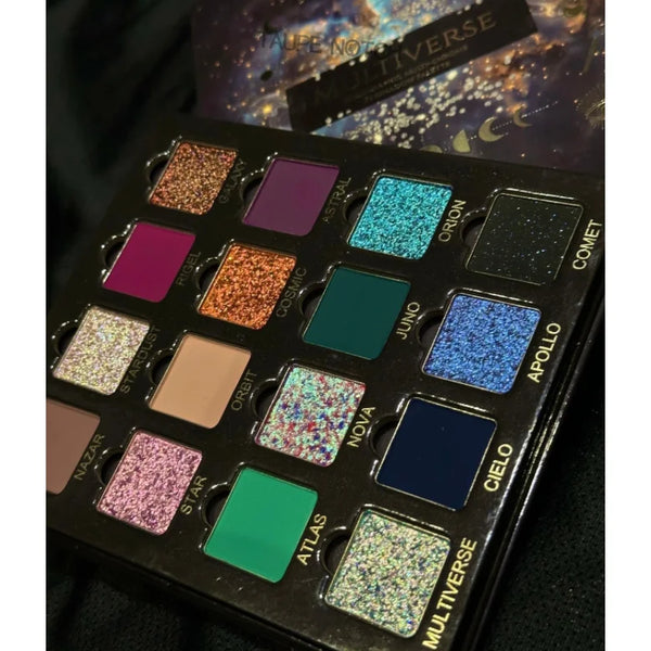 Multichrome magnetic eyeshadow palette with glittery multicolored pans: gold, aqua, and navy