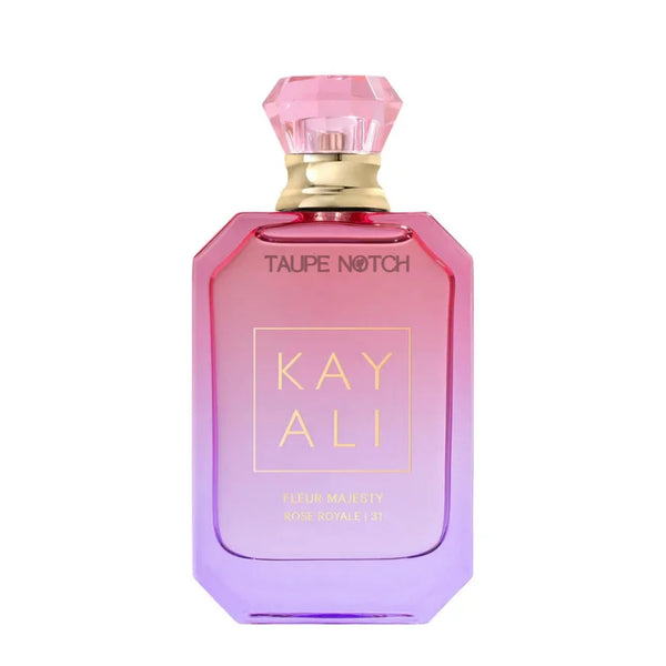 KAYALI eau de parfum bottle with pink liquid and gold faceted cap