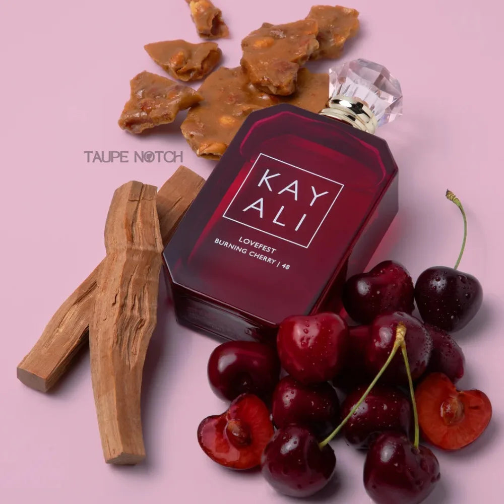Kayali Lovefest Burning Cherry eau de parfum bottle with cherries and wood accents