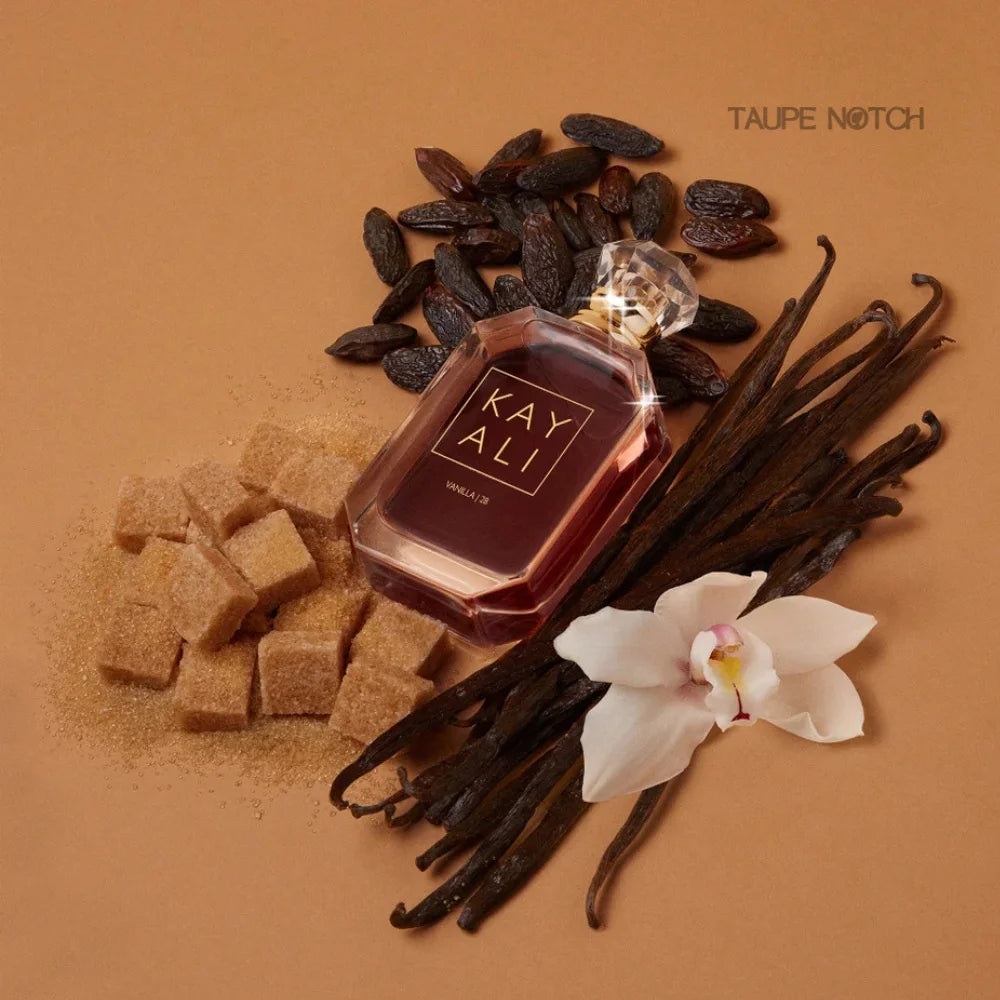 Kayali Vanilla 28 eau de parfum bottle with gold cap, dark maroon glass