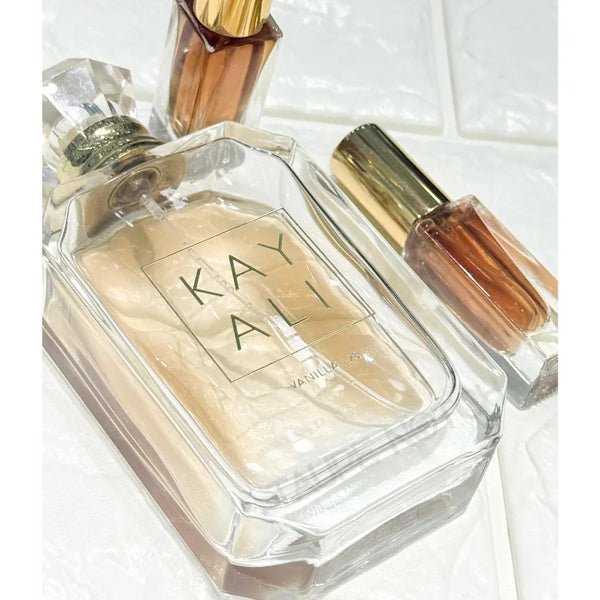 Kayali Vanilla 28 eau de parfum bottle close-up, clear glass with gold-toned cap