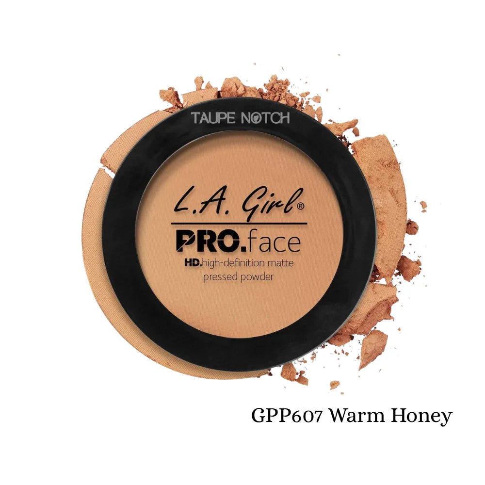 Pressed face matte powder compact, warm honey tan-beige tone with black lid and label