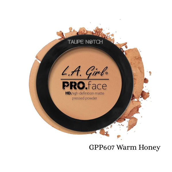 Pressed face matte powder compact, warm honey tan-beige tone with black lid and label