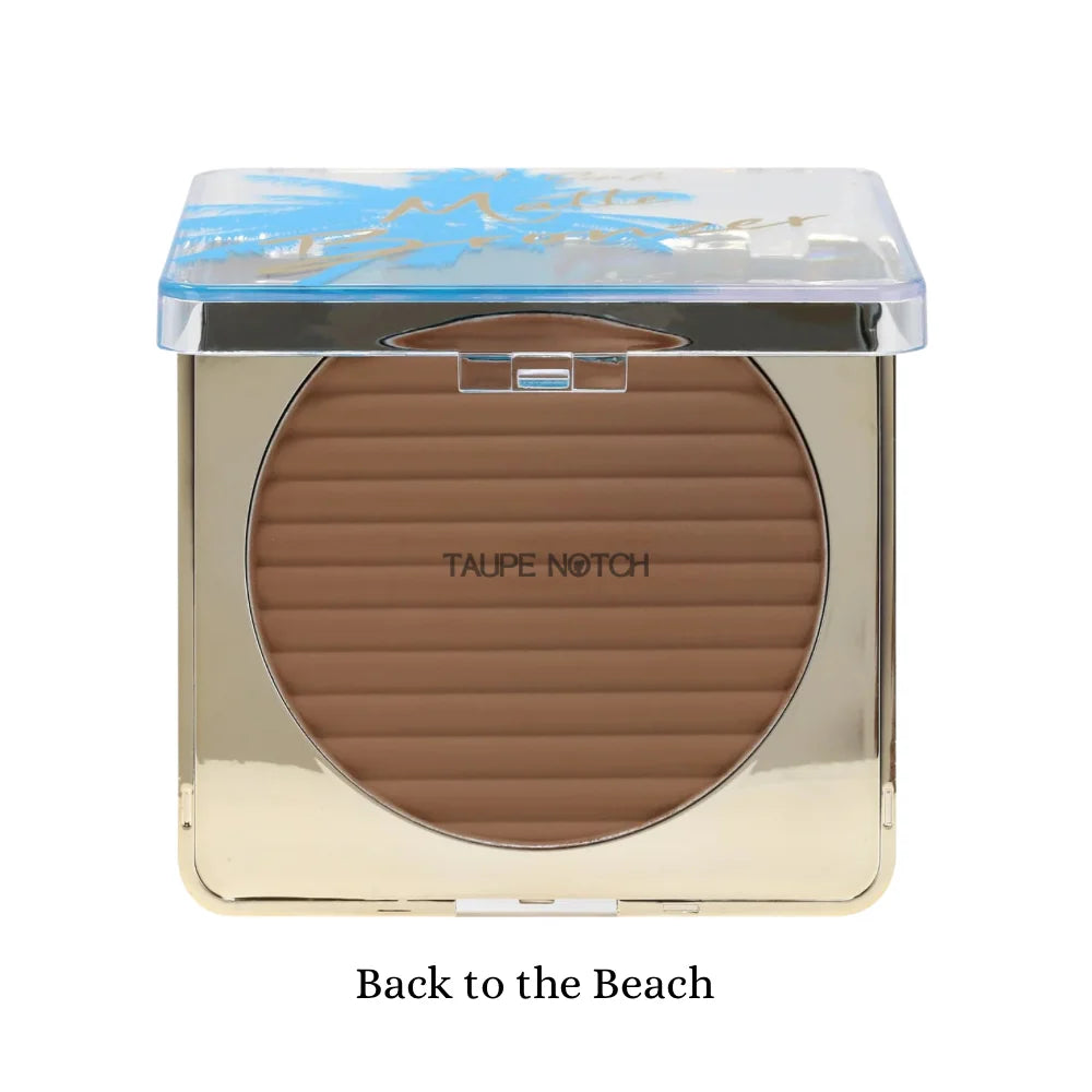 Matte bronzer compact in Back to the Beach shade, showing a taupe-brown pan with ridges