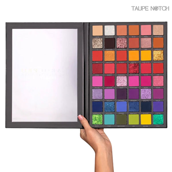 Laroc Pro Chapter 2 eyeshadow palette opened, finger pointing at shade row