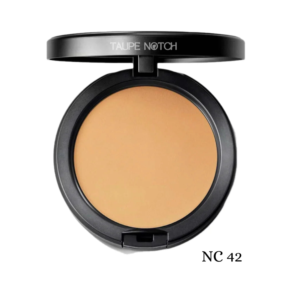 Powder foundation compact with NC 42 shade pan, deeper warm tan beige tone
