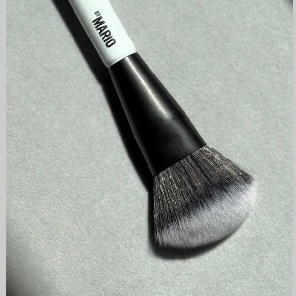 Makeup by Mario F4 brush close-up, black handle and gray bristles
