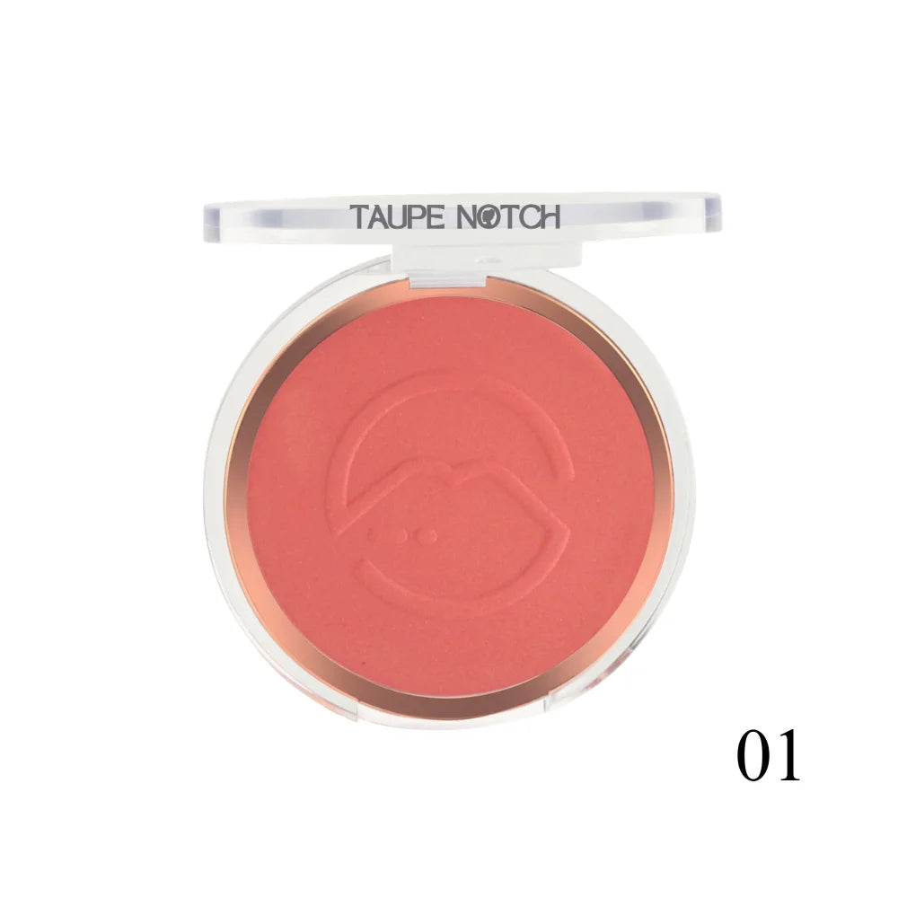Pressed face blusher compact, coral-pink powder shade 01 with embossed heart logo.