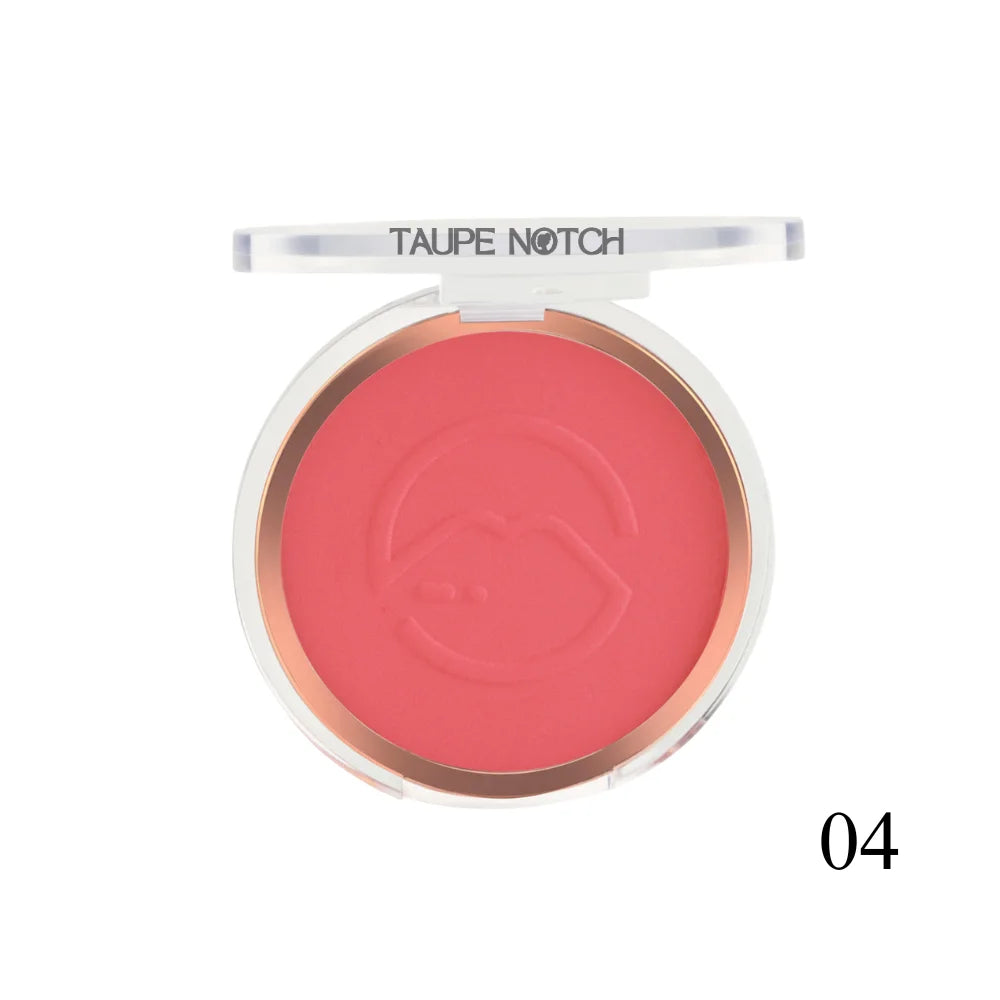 Pressed face blusher compact, pink-coral powder shade 04 with embossed heart logo.