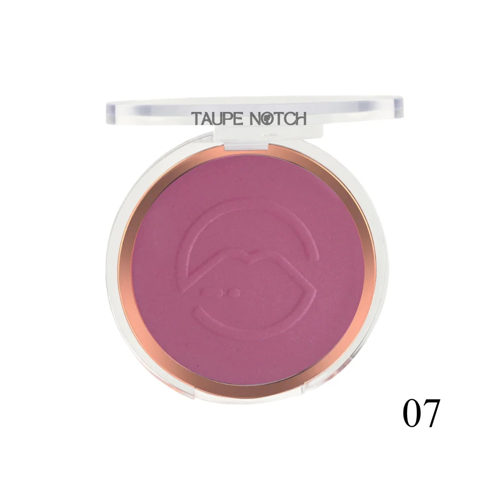 Pressed face blusher compact, deep plum-purple powder shade 07 with embossed heart logo.