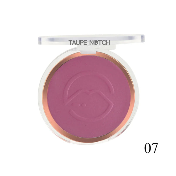 Pressed face blusher compact, deep plum-purple powder shade 07 with embossed heart logo.