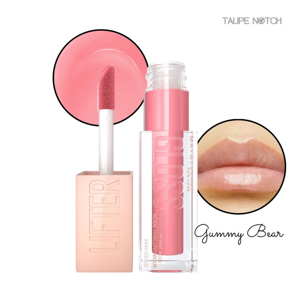 Lip gloss in Gummy Bear shade, clear tube with pink tint and doe-foot applicator; glossy lips close-up.