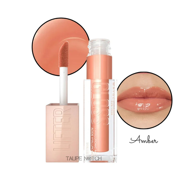 Lip gloss in Amber shade, clear tube with peachy-coral tint and doe-foot applicator; glossy lips close-up.