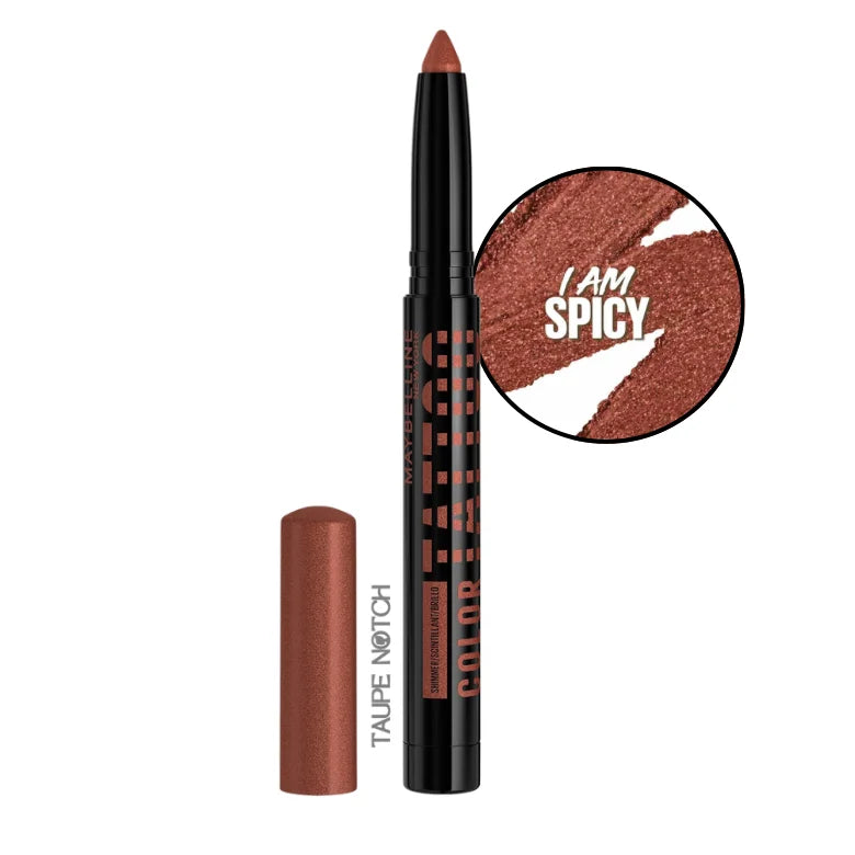 Maybelline Color Tattoo eyeshadow stick in copper-brown shimmer, with matching capped tip.