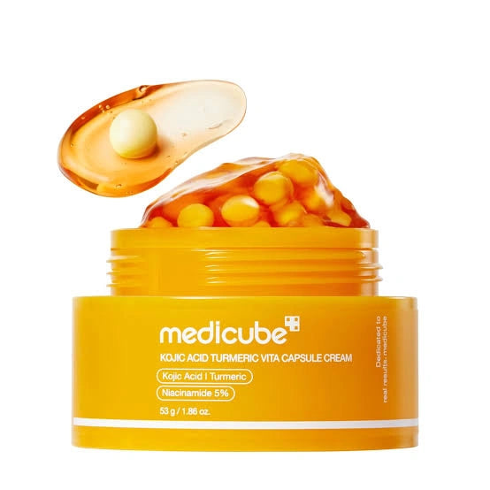 Medicube Kojic Acid Turmeric Vita Capsule Cream jar with open lid and yellow capsule