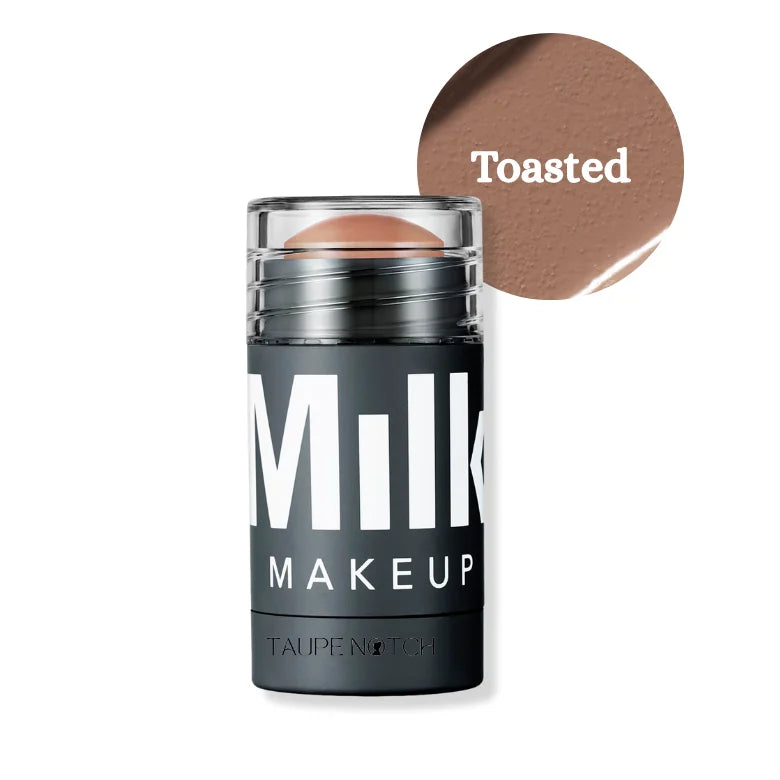 Milk Makeup Sculpt Stick in Toasted warm mauve brown shade on dark background
