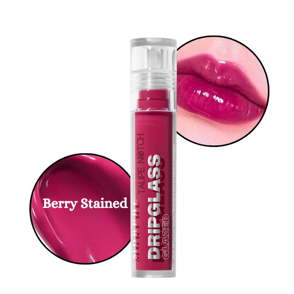 High-shine lip gloss in deep berry magenta with high-gloss glazed finish