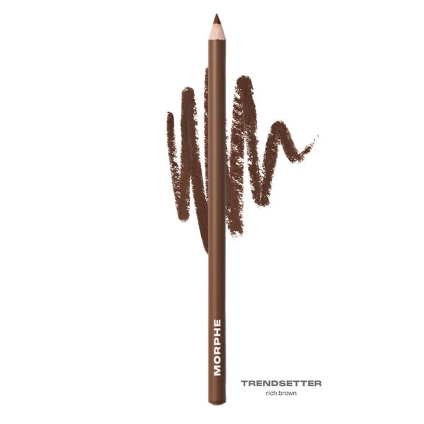 Lip pencil in Trendsetter rich brown with swatch marks and pointed tip