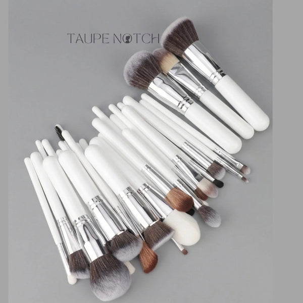 Shein makeup brush set cluster with white handles, silver ferrules, dense round brush heads.