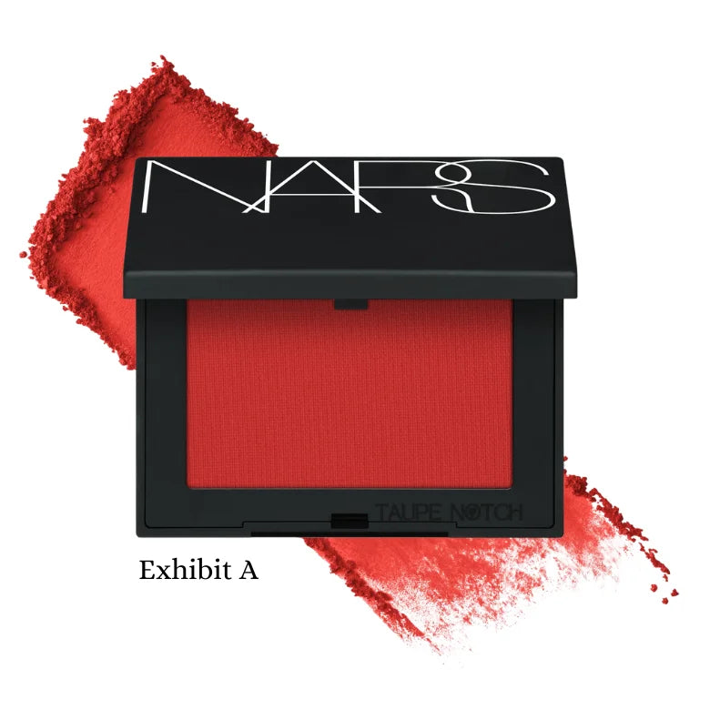 Powder blush compact, Exhibit A shade deep red powder in NARS case.