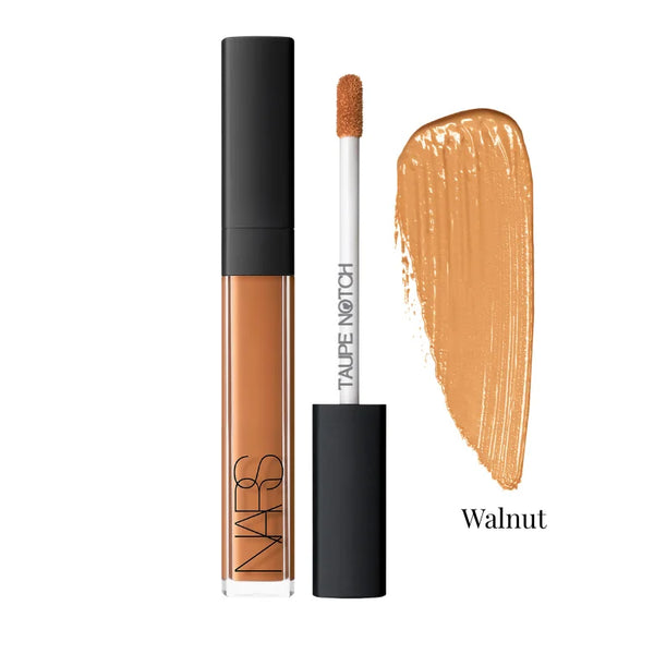 Concealer in Walnut shade with tube, doe-foot applicator, and medium brown swatch.