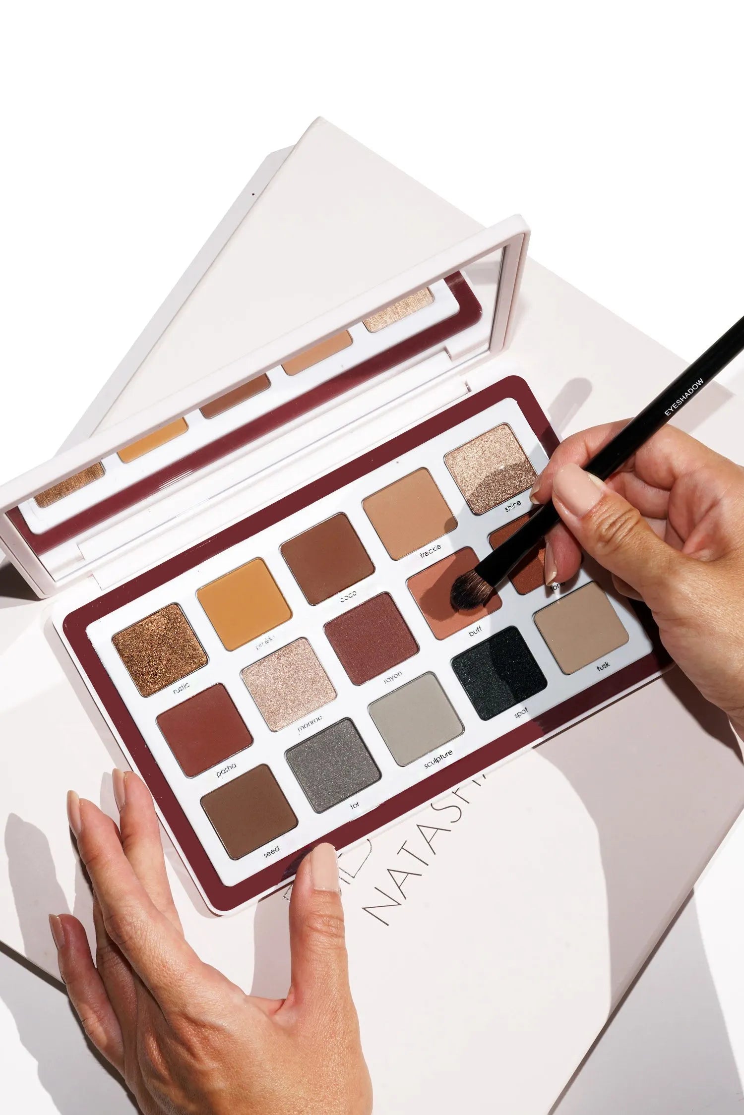 Biba eyeshadow palette open with neutral matte and shimmer pans