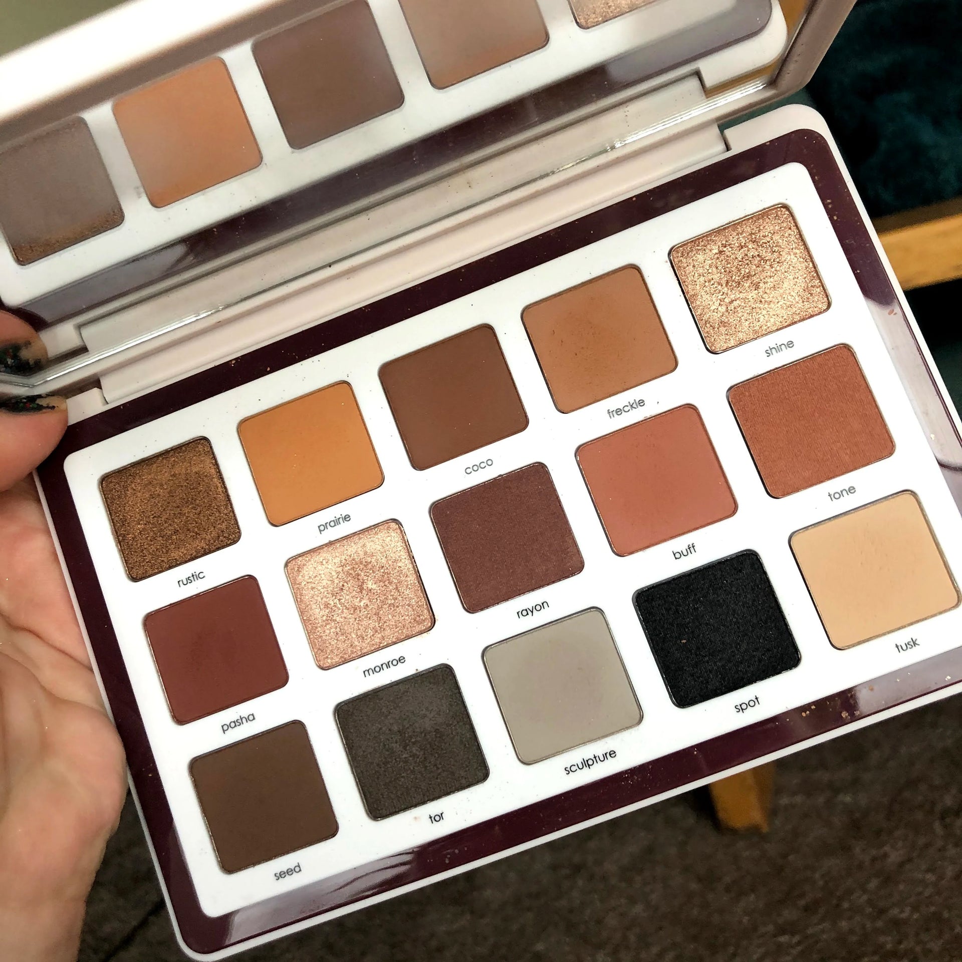 Biba eyeshadow palette close-up showing mixed matte and shimmer neutral shades