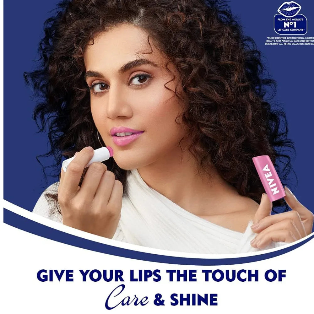 NIVEA lip balm stick held near lips during application