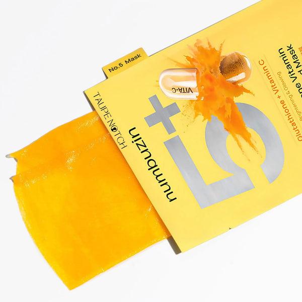 Yellow No.5 face mask sheet packet with orange flower design