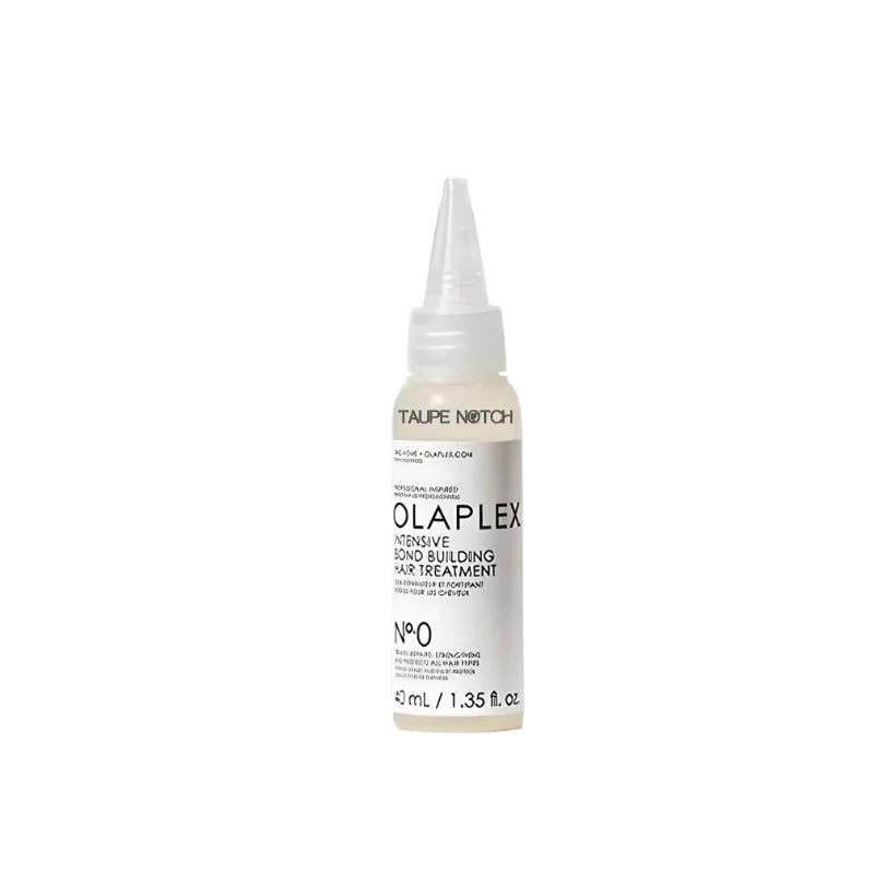 Olaplex No.0 bond-building hair treatment bottle, back label view, clear spray top