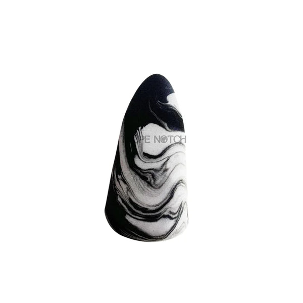 Tongue-shaped marble beauty sponge, black and white swirl design