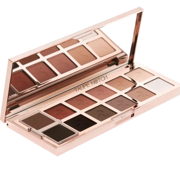 Open eyeshadow palette showing matte taupe, brown, and cream shades with mirror lid