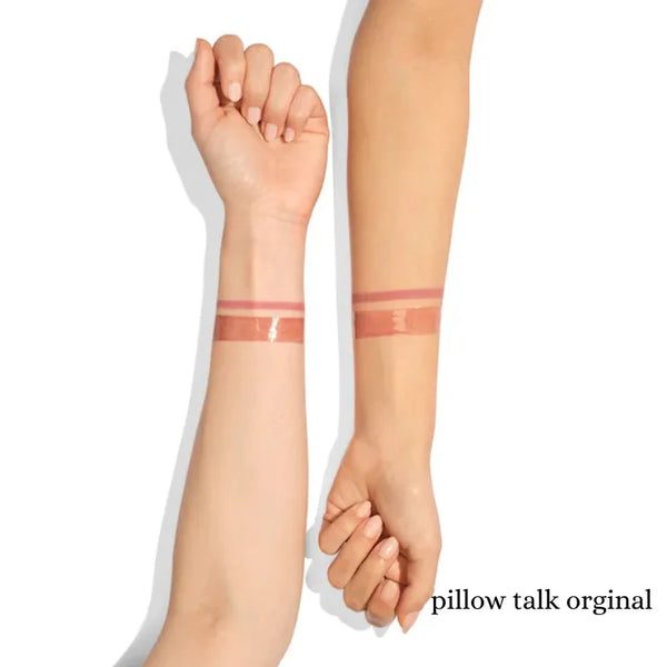 Glossy lip color swatch on forearm and wrist, mauve-pink from mini lip gloss duo