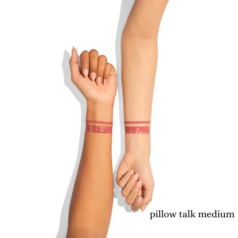 Glossy lip color swatch on forearm and wrist from mini lip gloss duo