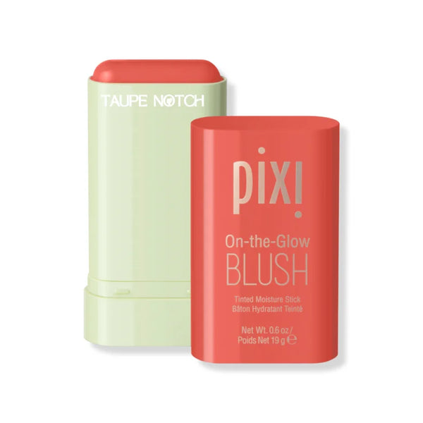 Moisture blush stick with pale green base, coral label, and orange-red cap