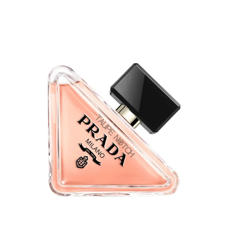 Prada Paradoxe eau de parfum triangular bottle with black cap, pink liquid