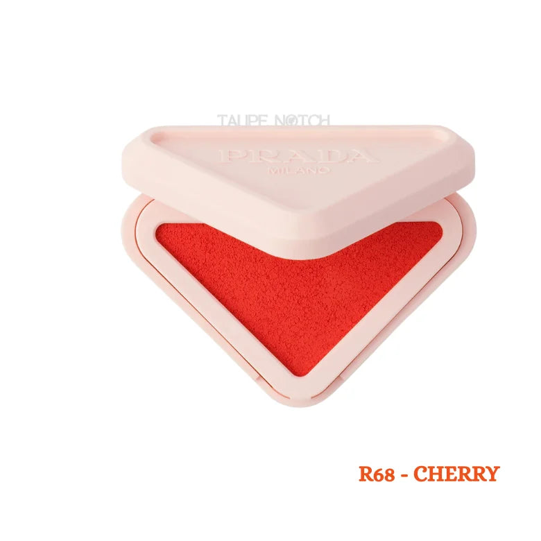 Prada Milano Blush Refillable Powder Blush in R68 Cherry open triangle compact showing bold red orange shade