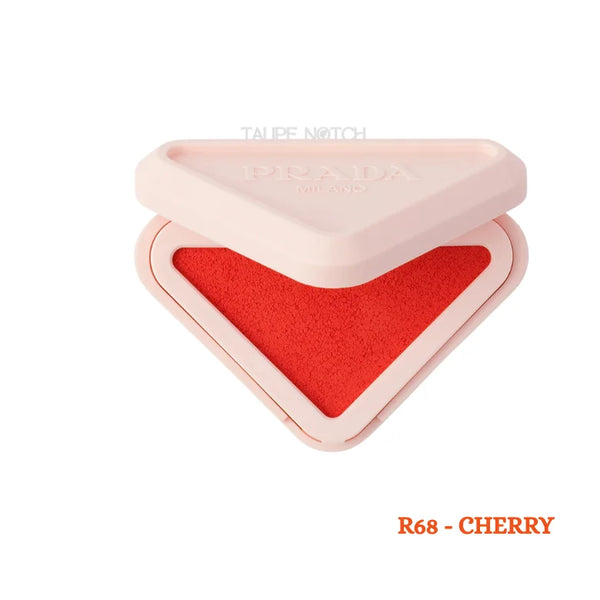 Prada Milano Blush Refillable Powder Blush in R68 Cherry open triangle compact showing bold red orange shade