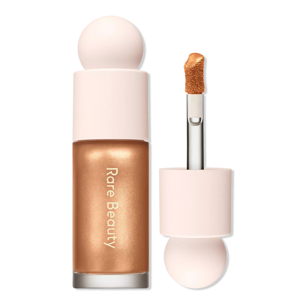 Liquid luminizer bottle with bronze-gold liquid and doe-foot applicator
